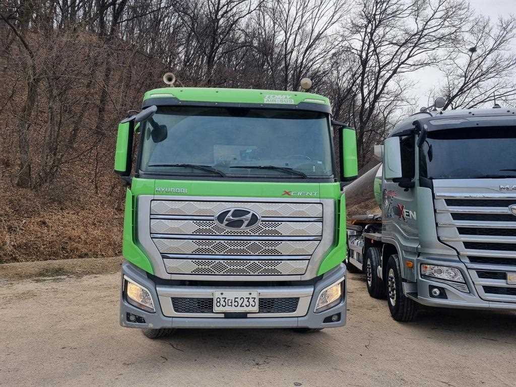 현대 트라고 엑시언트 프로 암롤